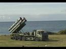 Coastal truck battery firing a Navy Harpoon...